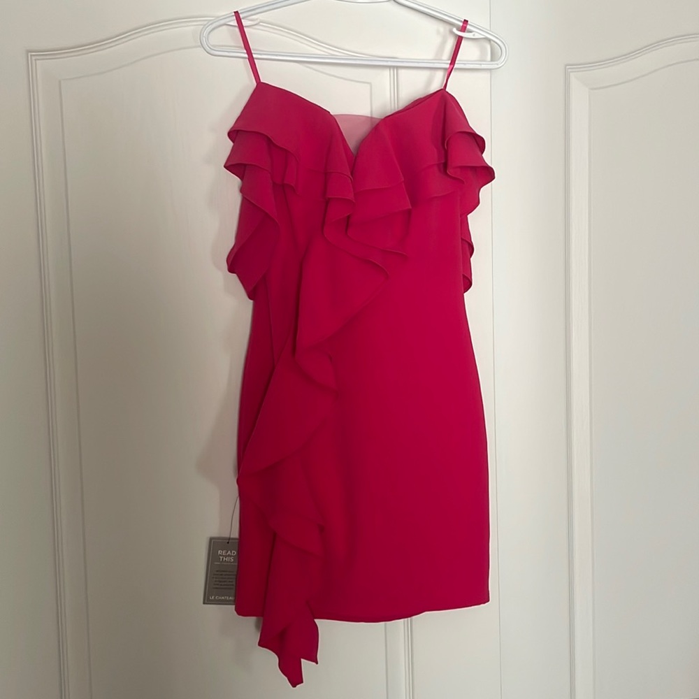 Fuchsia ruffle, Le chateau lined mini dress. Elegant and sassy size XS brand new
